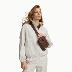 Превью товара: “Сумка поясная Essential Crossbody UA, цвет Incense Brown/Summit White”, купить в интернет магазине